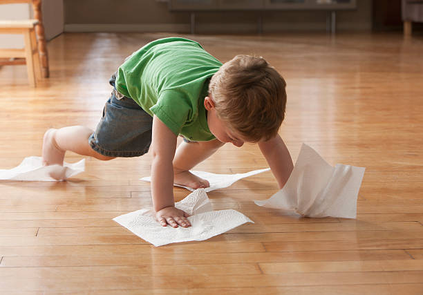 Kid cleaning floor | Ronnie's Carpets & Flooring