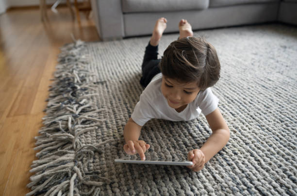 Girl lying on rug | Ronnie's Carpets & Flooring