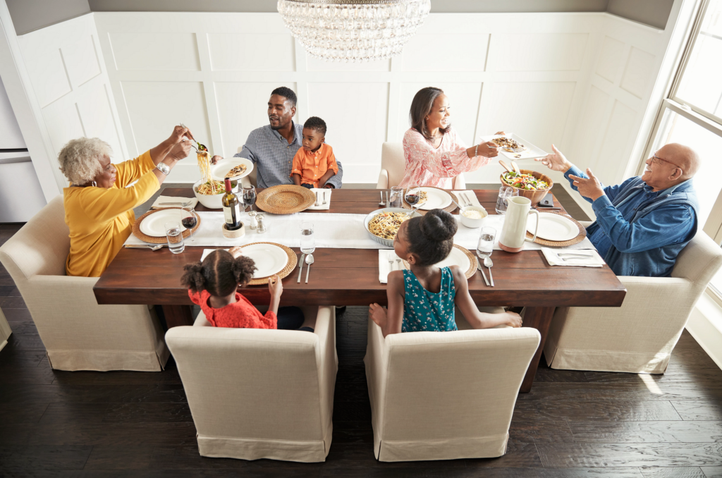 Happy family enjoying break fast | Ronnie's Carpets & Flooring