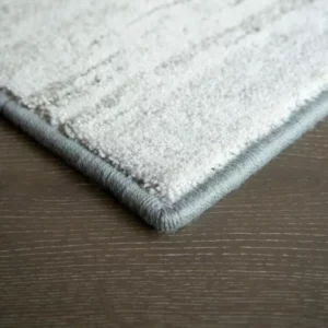 serging-circle Custom Rugs | Ronnie's Carpets & Flooring